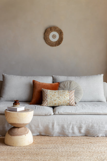 Wanddecoratie met raffia en schelp