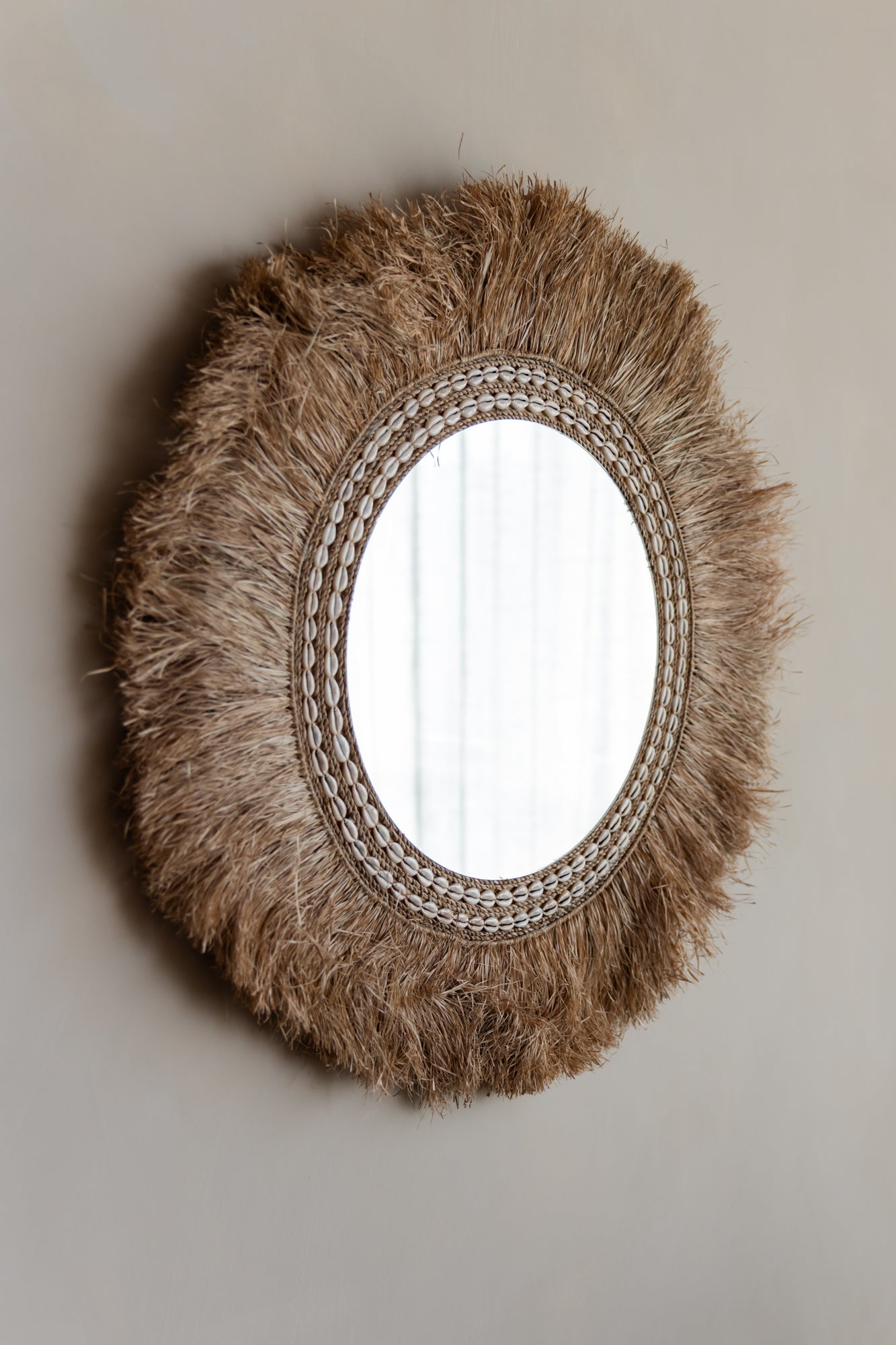 Ronde raffia wandspiegel